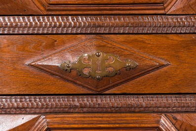 An imposing baroque-style parquetry oak four-door cupboard, 19th C.