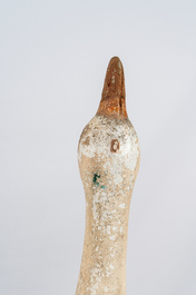 A patinated stone goose, 20th C.