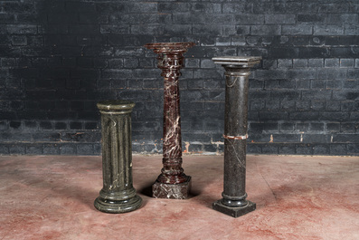 Two marble stands and one faux-marble-painted wooden stand, 19/20th C.