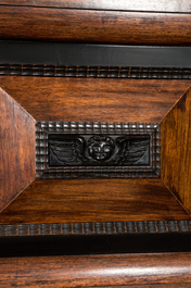 A Dutch partly ebonised wooden four-door cupboard, 19th C.