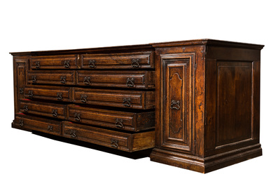 An imposing Italian walnut sacristy commode, 17th C.