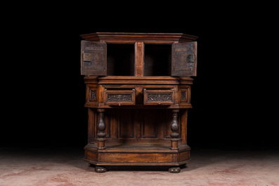 A walnut 'credence' case with portrait medallions, probably France, late 17th C. with later elements