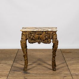 A gilt wooden console with putti and blazons and a marble top, 19th C.