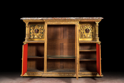 A polychrome and partly gilt wooden Renaissance Revival cabinet with trompe l'oeil doors, Italy, 19th C.