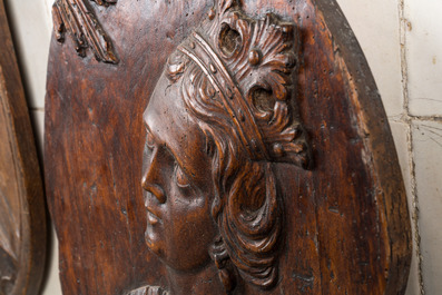 Two oval wooden medallions with a bishop and the annunciation, 17/18th C.