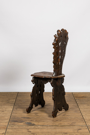 A richly carved Italian walnut sgabello, 19th C.