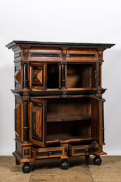 A Dutch partly ebonised wooden four-door cupboard, 19th C.