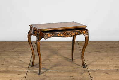 A French Louis XV-style bronze mounted floral marquetry side table, 19th C.