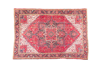 A large rectangular ornamental Heriz rug, 1st half 20th C.