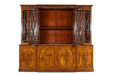 A large English magohany four-door break fronted library bookcase, 19th C.