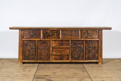 A Chinese elmwood sideboard, 19/20th C.