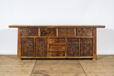 A Chinese elmwood sideboard, 19/20th C.