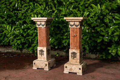 A pair of neoclassical marble stands with bronze mounts, 19/20th C.