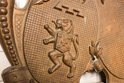 A gilt cast iron armorial wall plaque, 20th C.