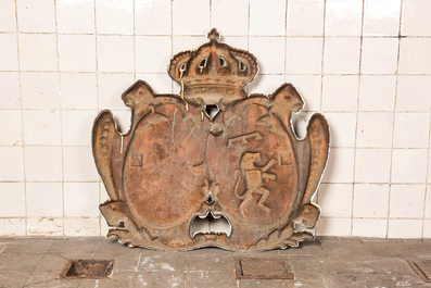 A gilt cast iron armorial wall plaque, 20th C.