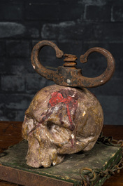 A macabre polychrome wood sculpture with a skull, 19/20th C.