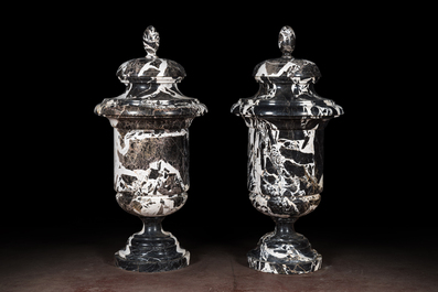 A pair of large black and white 'Grand Antique' marble vases and covers, probably Italy, 19/20th C.