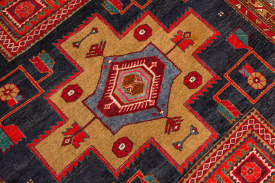 A large rectangular ornamental Meshkin rug, Northwest-Persia, 19/20th C.