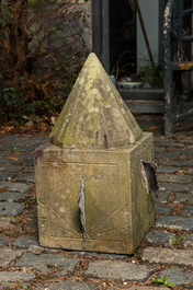 A carved stone sundial with lead indicators, 19th C.