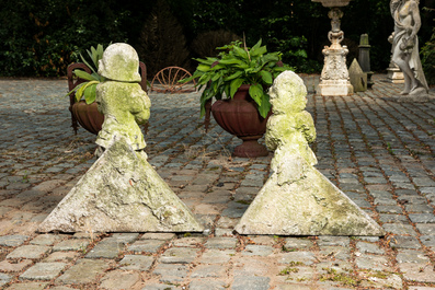 A pair of carved stone roof ornaments with historical warriors, 19th C.