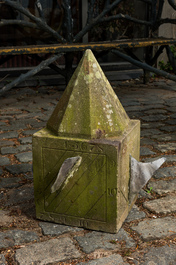 A carved stone sundial with lead indicators, 19th C.