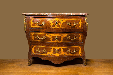 A French mahogany veneered commode &agrave; tombeau with floral marquetry, marble top and gilt bronze mounts, 18th C.