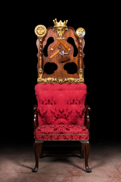 An imposing English partly gilt wooden masonic throne chair, 19th C.