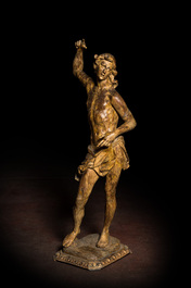 A large Flemish basswooden figure of a male youngster, 18th C.