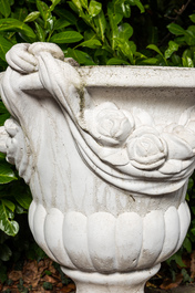 A white painted concrete garden urn on stand, 20th C.