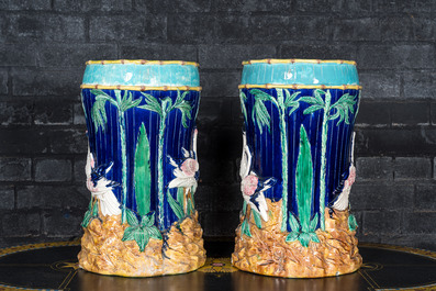 A pair of polychrome glazed jardini&egrave;re stands with flamingos, 20th C.