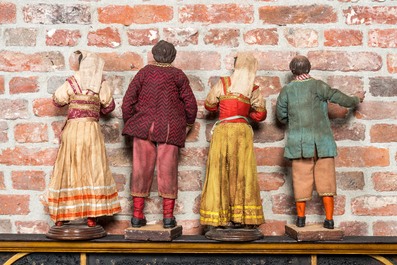Two pairs of Italian polychrome wooden and terracotta figures in traditional costume, Napoli, 19th C.