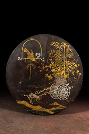 A black lacquered table with polychrome chinoiserie design and mother-of-pearl inlay, ca. 1900