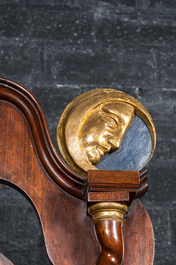 An imposing English partly gilt wooden masonic throne chair, 19th C.