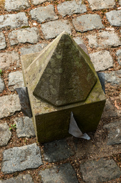 A carved stone sundial with lead indicators, 19th C.