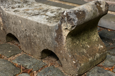 A carved stone double arch-shaped garden ornament and a bird bath, 19th and 20th C.