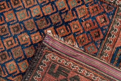 Three various Oriental rugs, wool on cotton, 20th C.