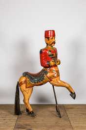 Un cheval de carrousel en bois &agrave; d&eacute;cor polychrome, 20&egrave;me