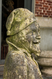 A stone sculpture of a wounded soldier, early 20th C.