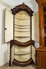 A large baroque-style four-door corner cupboard, probably Italy, 18/19th C.