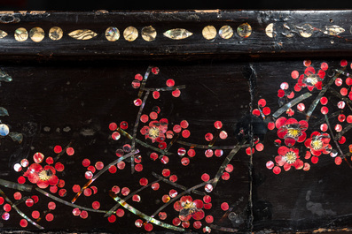 A black lacquered table with polychrome chinoiserie design and mother-of-pearl inlay, ca. 1900