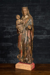 Een polychrome notenhouten Madonna met Kind met druiventros in de hand, vermoedelijk Antwerpen, 16e eeuw