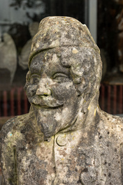 A stone sculpture of a wounded soldier, early 20th C.