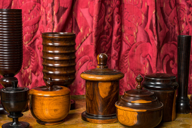 A varied collection of vases and boxes with covers in various types of wood, 20th C.