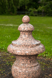 A red granite decorative vase, 20th C.