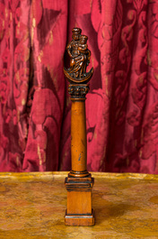 A walnut Madonna and Child on the crescent moon on a Corinthian column, 17/18th C.