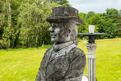 A large concrete garden statue with lighting in the shape of a galant rider on horse, 20th C.