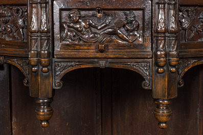 A carved oak wooden credenza, 17th C. with later elements