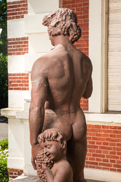 A large cast iron sculpture of two Bacchantes, 20th C.