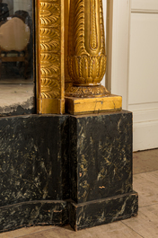 An impressive French Empire-style gilt wooden mirror on faux marble-painted stand, 19th C