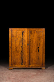 A walnut two-door cupboard, 19th C.